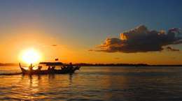 Sunset Mekong River front of Royal Palace Phnom Penh Cambodia