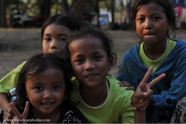 The smile of local kids at the Angkor Wat temple in Siem Reap, Cambodia