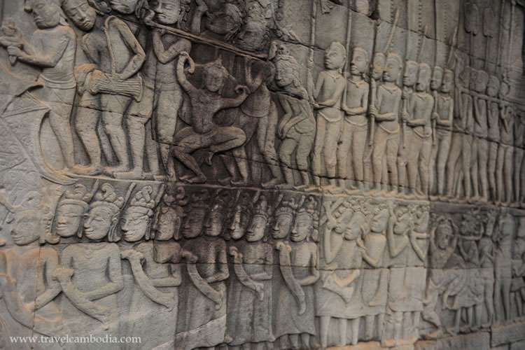 Detail of a stone carved relief at the landmark Angkor Wat in Cambodia.
