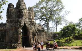 Tourists are visiting the Angkor Wat temple